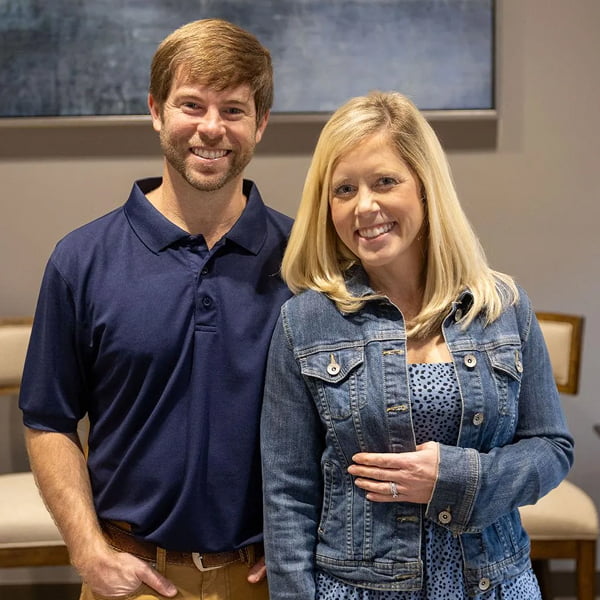 Dr. Grant Bale and Dr. Oliver James smiling together in a warm, welcoming environment at Neville Dental Studio